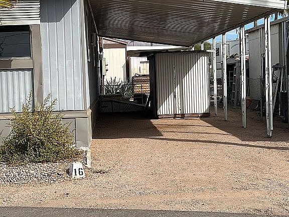 Carport area and shed 1. 