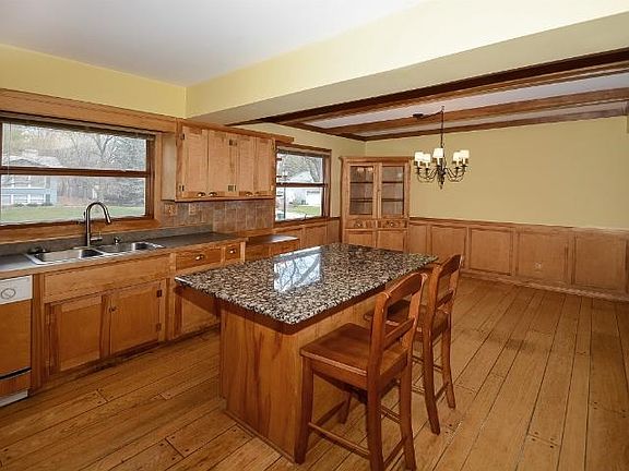 Beautiful birch cabinets and granite center island.  No shortage of space in this kitchen!
