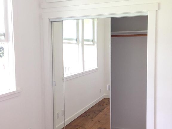 6' closet with overhead cabinet storage in second and third