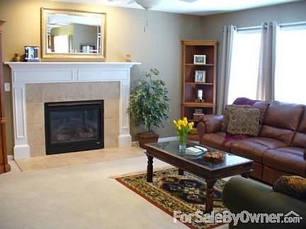 Open Family Room
						:
						Inviting family room with gas fireplace and ceiling fan for your comfort.