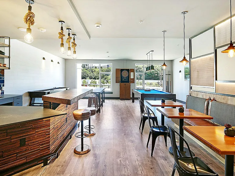 Experience luxury living with this chic entertainment lounge, perfect for social gatherings.