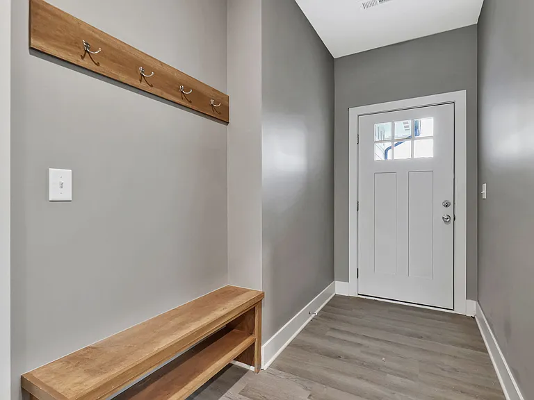 Entry hall with bench and coat rack