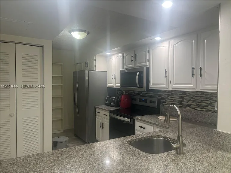 8580 SW 212th St #104 — Photo 5
