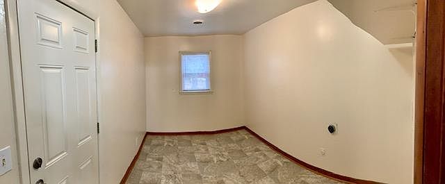 Large, new laundry room. has potential to subdivide into an additional bath for the right tenants
