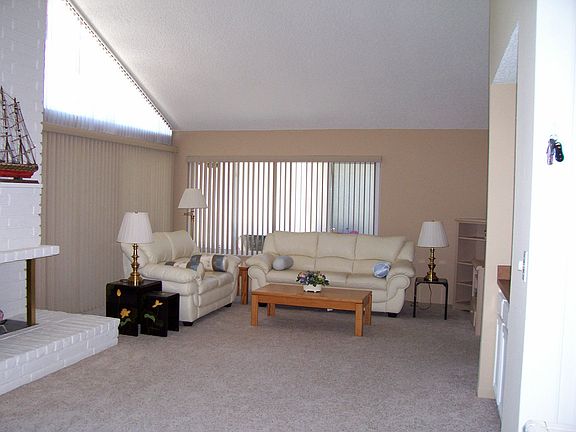 living room with vaulted ceilings