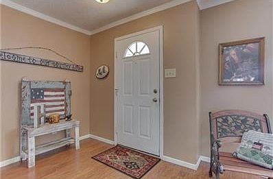 Step inside the front door to a down home country decor