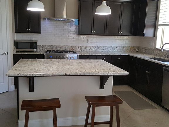 upgraded flooring, exotic granite, counter tops in kitchen