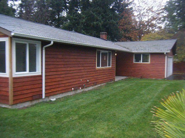 Large wrap-around yard.