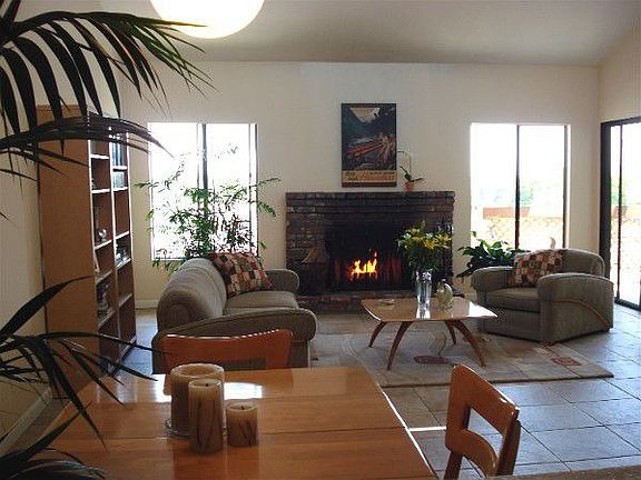 Lovely dining/living room combo with wood burning fireplace