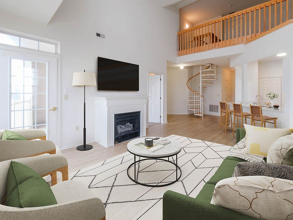 Living Room with Fireplace and Hard Surface Flooring