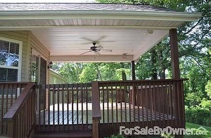 Outdoor ceiling fan on covered deck