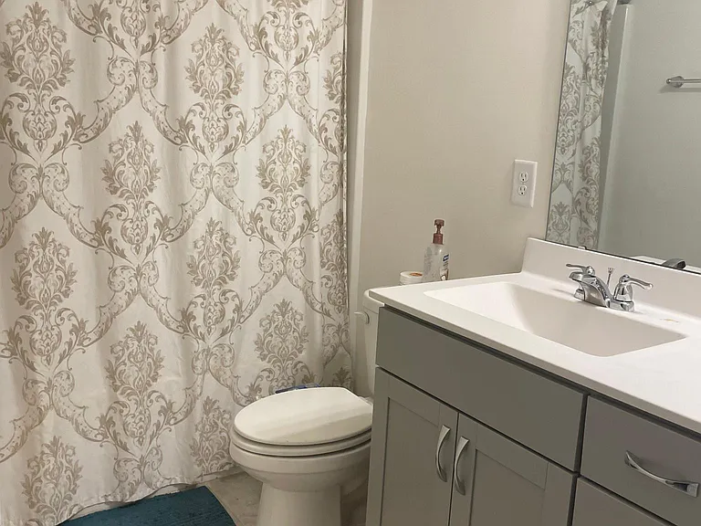 1st floor shared full bathroom with double sink