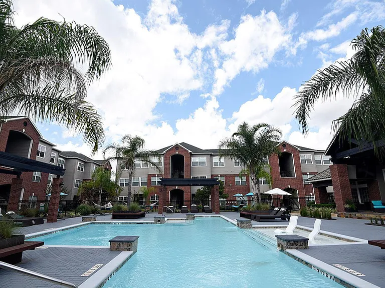 Poolside living just steps from your door where relaxation meets sunshine and style