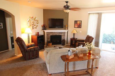 Great room with gas fireplace and walk-out to deck.