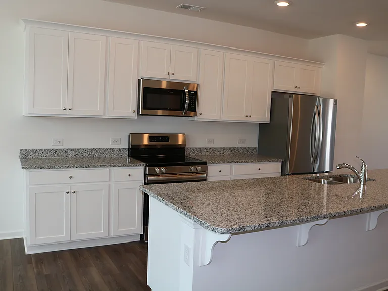 Kitchen with brand new appliances, incl. 4 door LG Refrigerator with icemaker & water dispenser