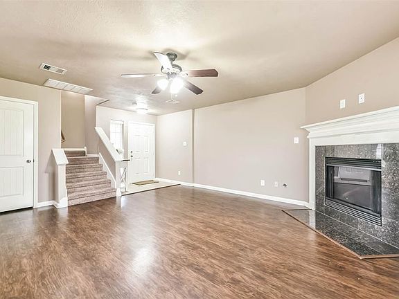 View of the foyer and door to the large storage closet.