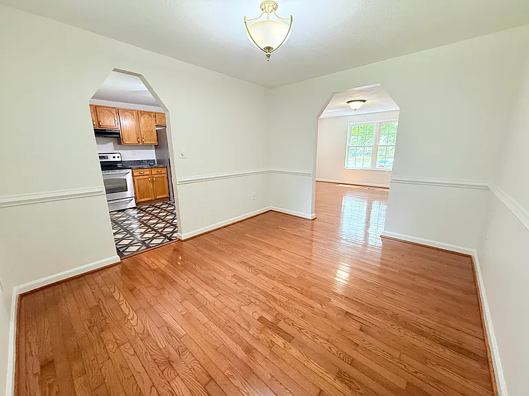 dining room flows into kitchen and living areas.