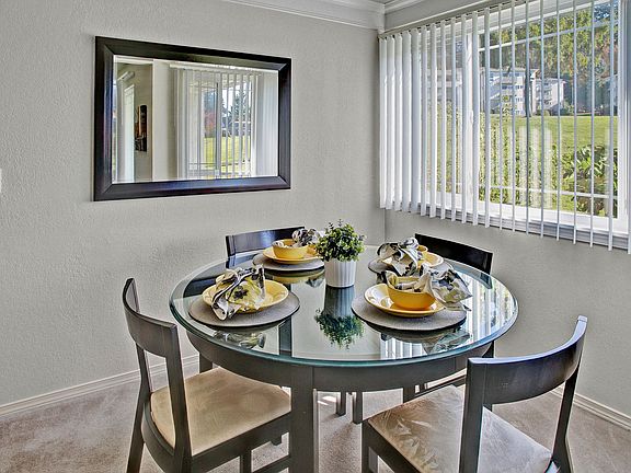Andorra Apartments - large dining room with great natural lighting