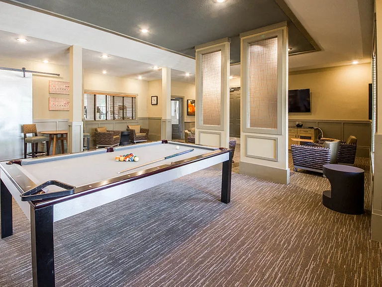 Game Lounge with pool table and separated lounge seating