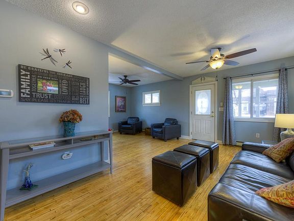 Main living area with true hardwood floors.
