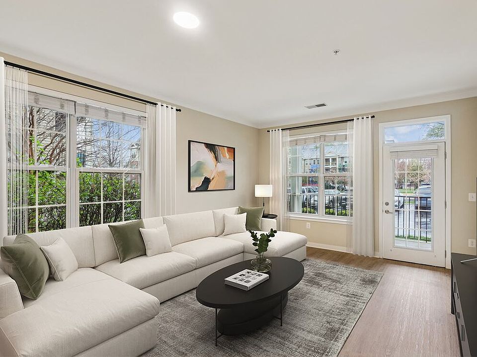 Renovated Package I living room with updated hard surface flooring