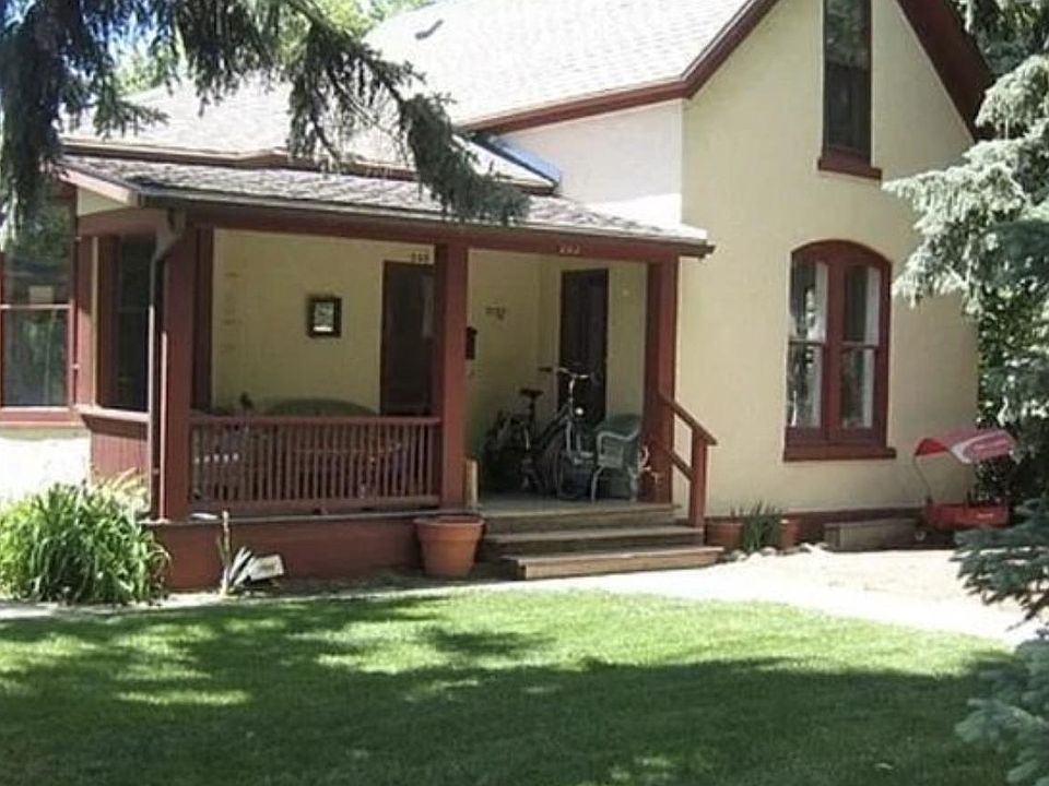 Lots of green surrounding the house.
