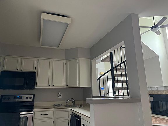 Kitchen with stainless appliances stove fridge, dishwasher / Washer /dryer