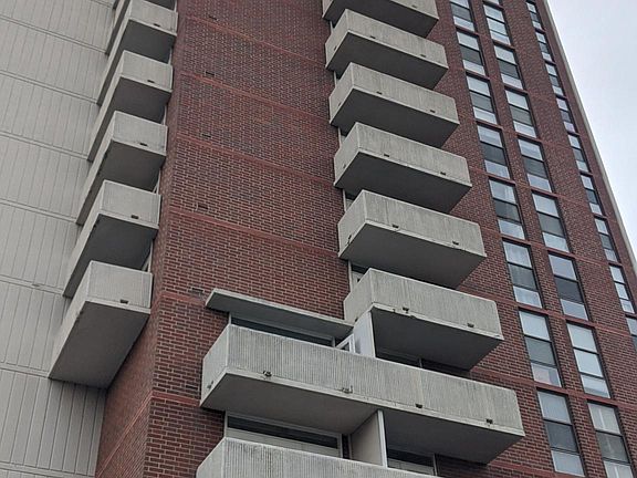 Balcony faces downtown and midtown skyline