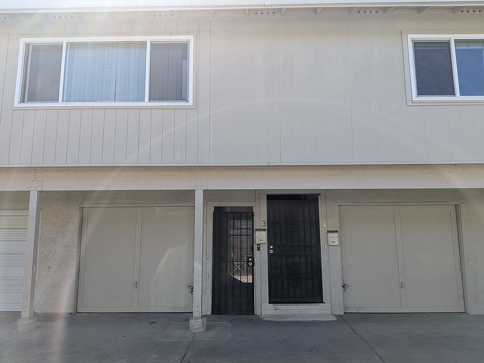 Downstairs gated entry and 2 separate 1-car garage for Apt 2