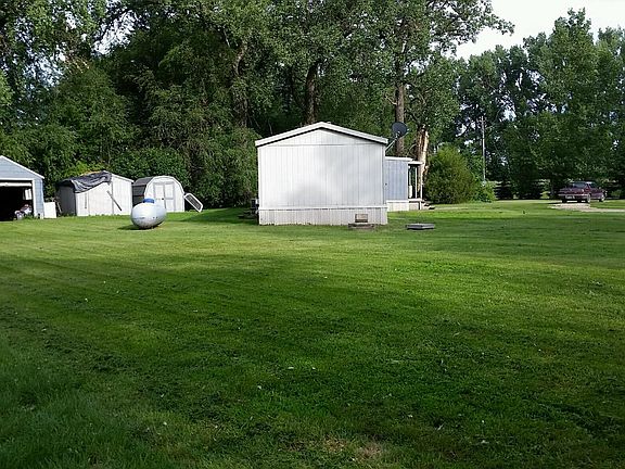 storage sheds behind house