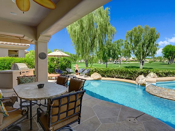 Outdoor dining; always shade on the patio over table.