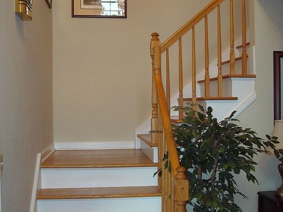 Open Wood Staircase, HW Floor Entry 