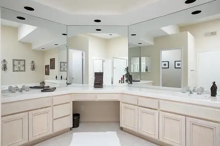 Main bathroom feature dual sinks, jacuzzi tub and spacious shower
