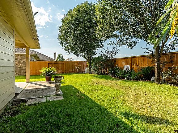 The home backs to a bayou and has a nice back patio to enjoy the quiet and privacy