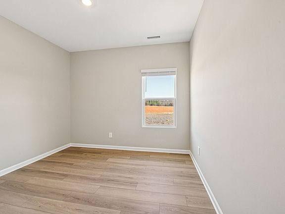 Secondary bedroom in the Chatham floorplan at a Meritage Homes community in Raleigh, NC.