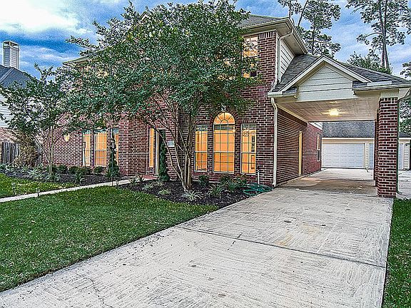 Qtr View - Carport & 3 Car garage