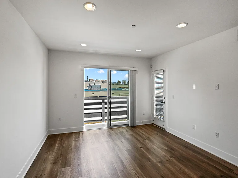 Living Room with Vinyl Flooring and Balcony