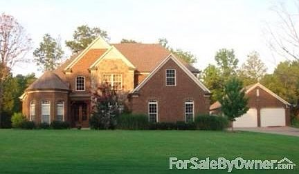 Beautiful Family Home
						:
						Stone /Brick exterior with professional landscaping. Detached garage.