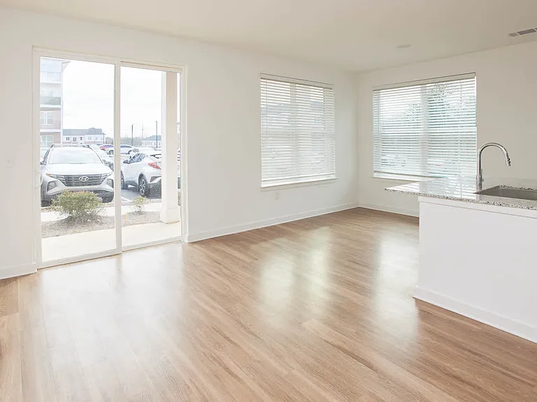 Living Room with Patio and Hard Surface Flooring