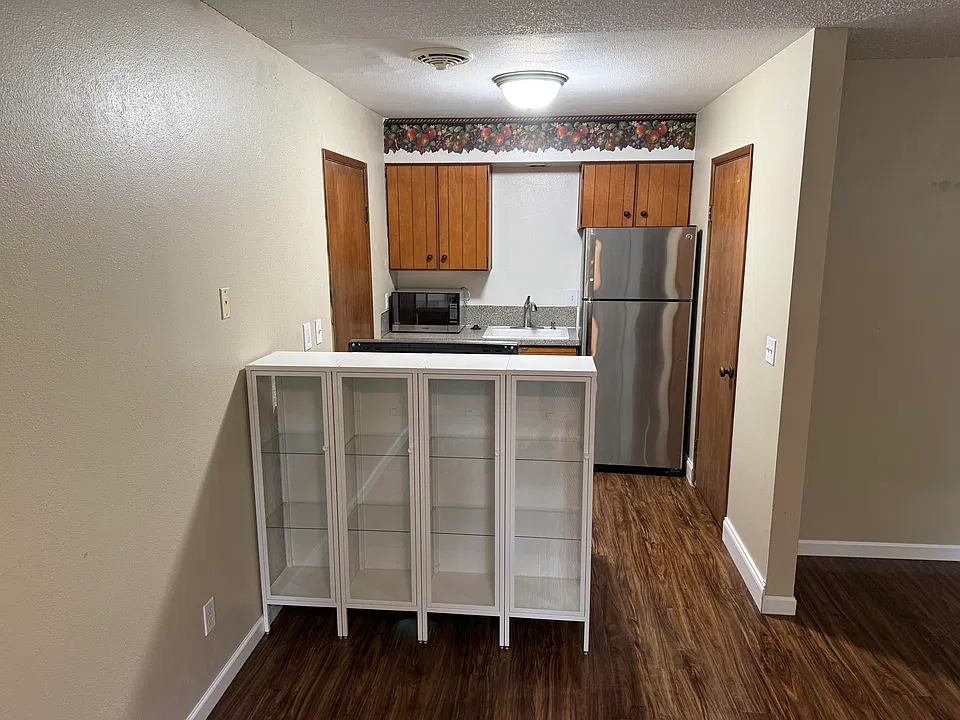 Updated view of kitchen area - storage cabinets are included.