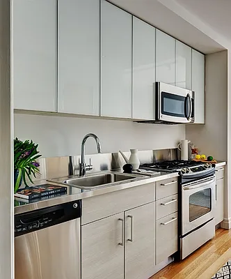 kitchen  Summit CK54SINKL 54 Inch All-In-One Kitchenette with 2-Door