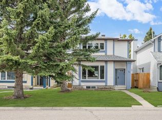 76 E Woodborough Cres SW, Calgary, AB T2W 5A2
