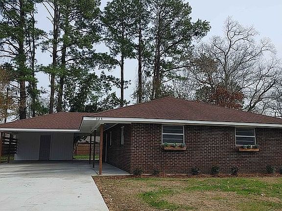 Front view with flower boxes