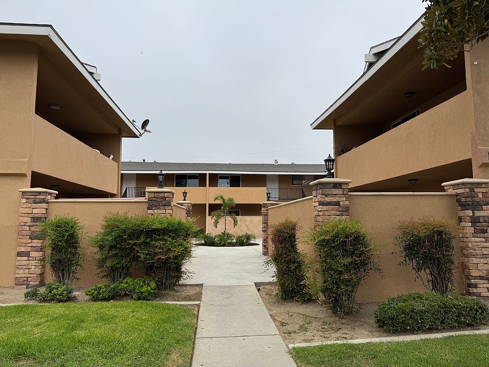 Outside of building remodeled February/March 2025. Added pillared, stacked stone and new cement in quad area. Also added planters, plants and palm trees in quad area.