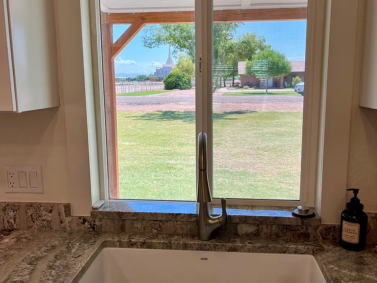 Kitchen window views of front yard