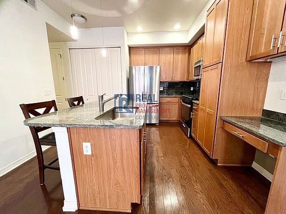 5th image of 1100 N Grant St Unit 306