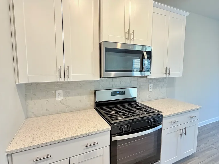 Beautiful kitchen with lots of cabinets and countertop space.