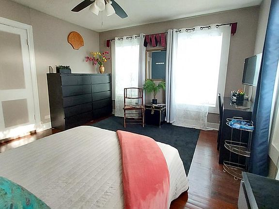 Windows facing side and backyard have blackout curtains.