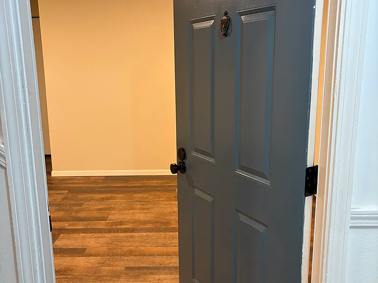 Front door opening to living room