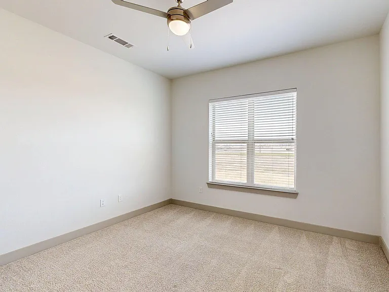 Spacious apartment Bedroom with Carpet Floor.